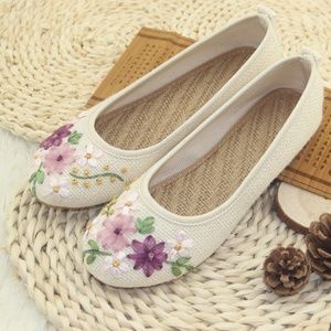 Brand new ladies sisal/cotton floral slip ons.